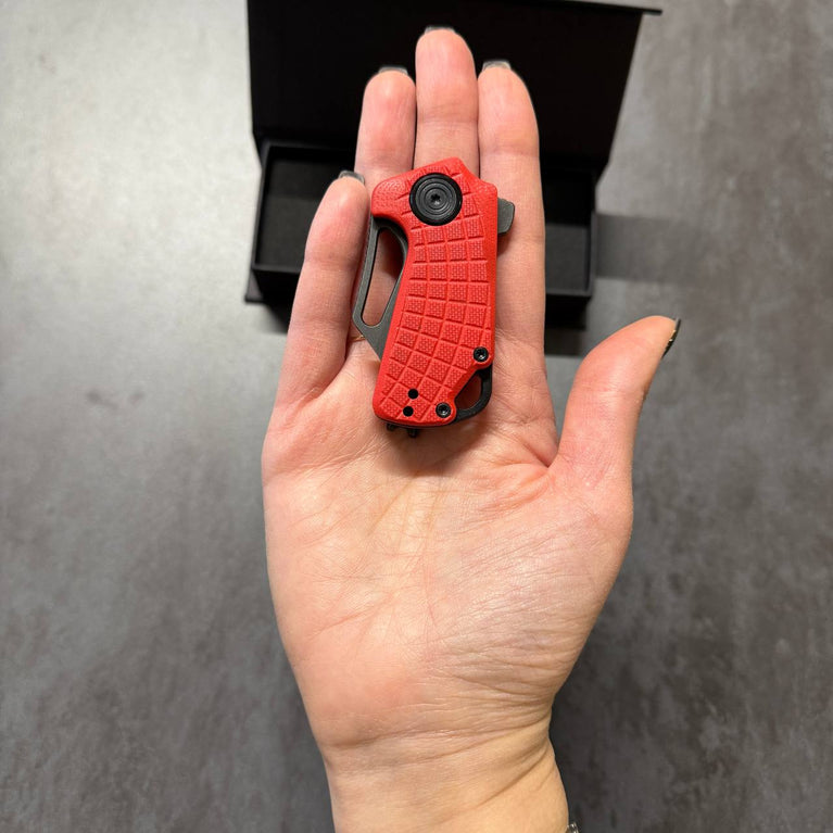 MICRO COLTELLO A LAMA PIEGHEVOLE PUCK CON IMPUGNATURA G10 ROSSA BLACK FOX