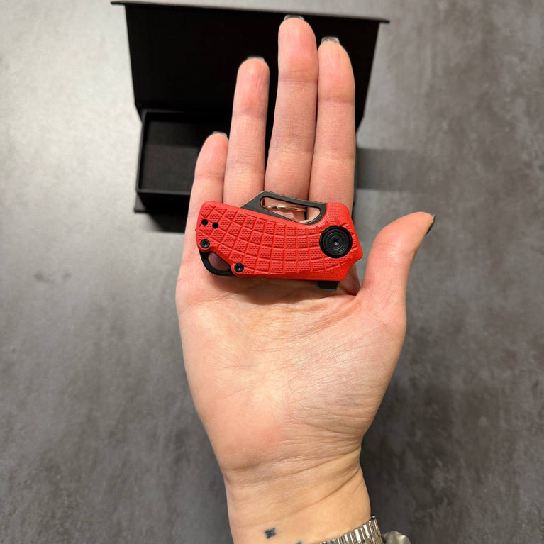 MICRO COLTELLO A LAMA PIEGHEVOLE PUCK CON IMPUGNATURA G10 ROSSA BLACK FOX