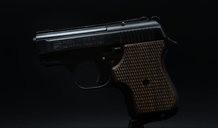 PISTOLA A SALVE 315 CALIBRO 8mm GUANCETTE IN LEGNO BRUNI