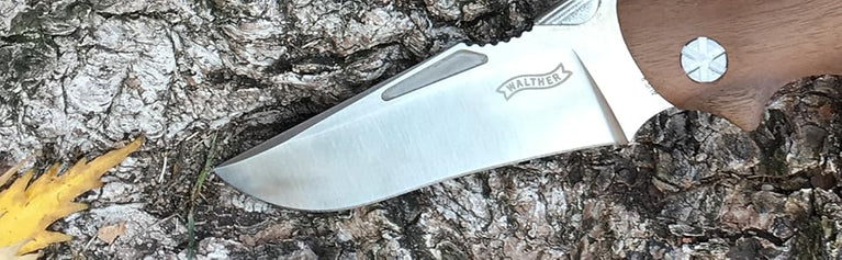 COLTELLO AFW CON LAMA RICHIUDIBILE E IMPUGNATURA IN LEGNO DI NOCE WALTHER